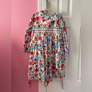 Marmelatta Floral Smocked Dress Size 6
In great condition.